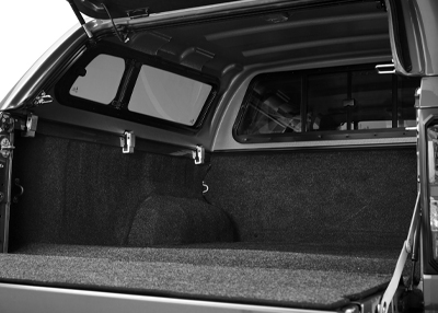 Bed liner compatible with hardtop canopies and tonneau covers